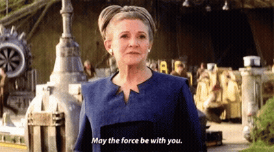 Woman In Blue Jacket Saying May The Force Be With You GIF