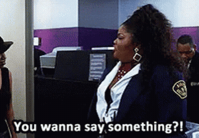 Woman In Blue Jacket Saying You Wanna Say Something GIF