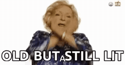 Woman In Blue Jacket Says Old But Still Lit GIF