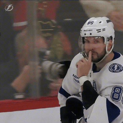 Woman In Blue Jacket Standing In Front Of Ok Got It Sign GIF