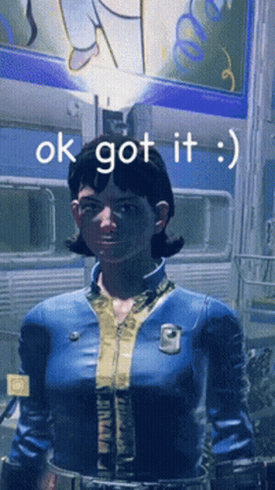 Woman In Blue Jacket Standing In Front Of Ok Got It Sign GIF