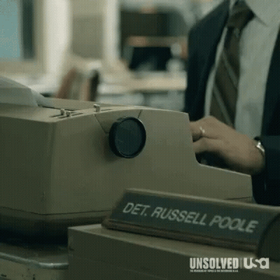 Woman In Blue Jacket With Necklace S GIF