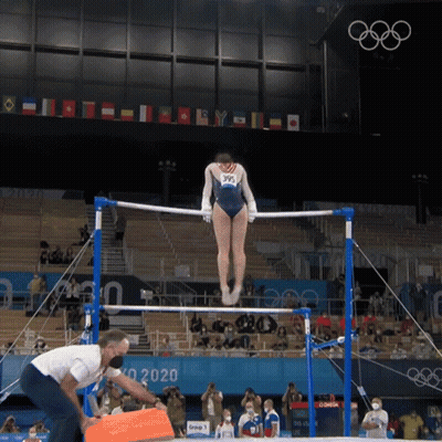 Woman In Blue Leotard Doing Parallel Bars GIF