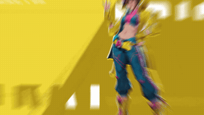 Woman In Blue Pants And Yellow Jacket GIF