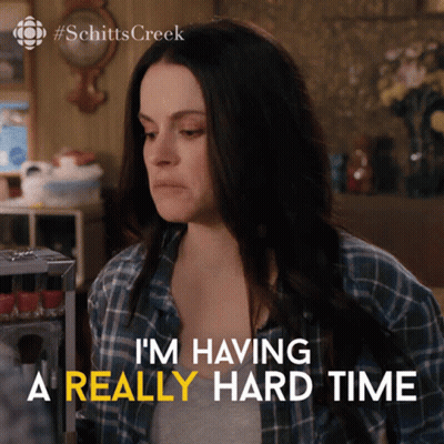 Woman In Blue Plaid Shirt Says Having A Really Hard Time GIF
