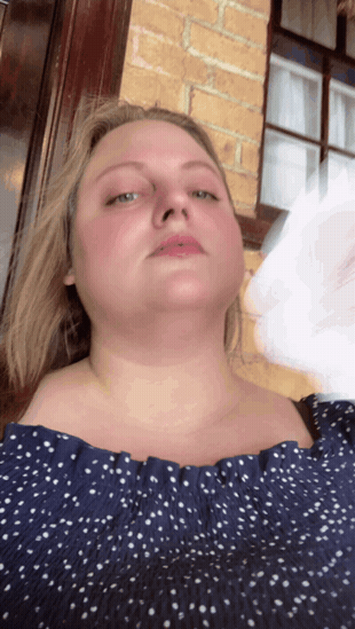 Woman In Blue Polka Dot Off Shoulder Top GIF