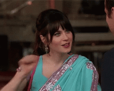 Woman In Blue Purple Sari Talking To Man GIF