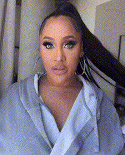 Woman In Blue Robe And Hoop Earrings GIF