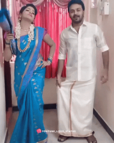 Woman In Blue Saree And Man In White Shirt Posing GIF