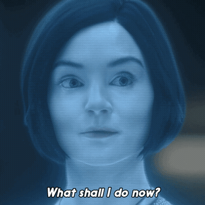 Woman In Blue Saying What Shall I Do GIF