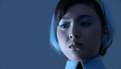 Woman In Blue Scarf GIF