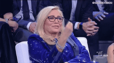 Woman In Blue Sequined Jacket Clapping GIF