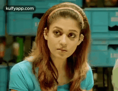 Woman In Blue Shirt And Headband GIF