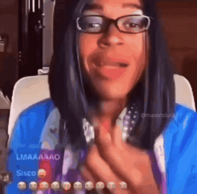 Woman In Blue Shirt And Pearls Holding Book And Pointing GIF