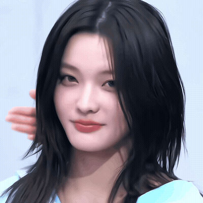 Woman In Blue Shirt Close Up GIF