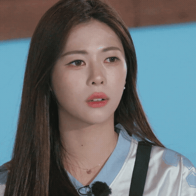 Woman In Blue Shirt Close Up GIF