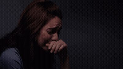 Woman In Blue Shirt Crying GIF