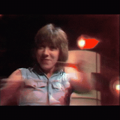 Woman In Blue Shirt Dancing GIF