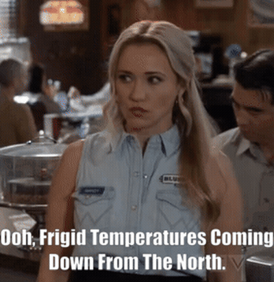 Woman in Blue Shirt Frigid Temperatures Coming Down From the North