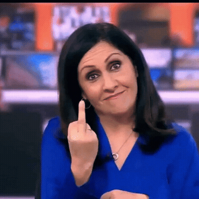 Woman In Blue Shirt Giving Middle Finger GIF