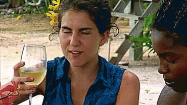 Woman In Blue Shirt Holding Wine Glass GIF