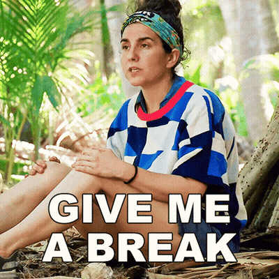 Woman In Blue Shirt Making Funny Face Another Woman Watches GIF