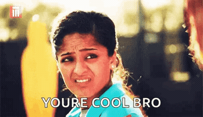 Woman In Blue Shirt Making Funny Face Saying Youre Cool Bro GIF