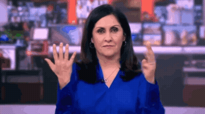Woman In Blue Shirt Making Rude Gesture GIF
