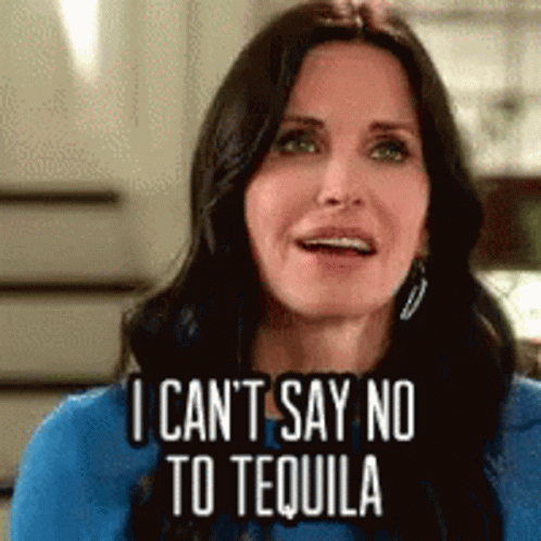 Woman In Blue Shirt Saying Can't Say No To Tequila GIF