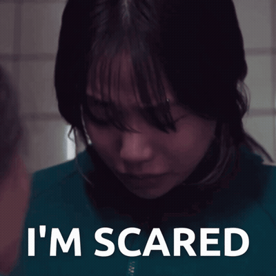 Woman In Blue Shirt Saying Im Scared GIF