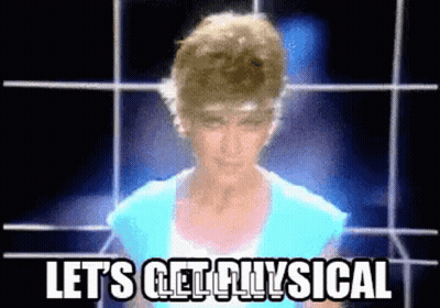 Woman In Blue Shirt Saying Lets Get Physical GIF