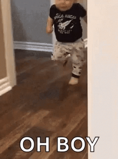 Woman In Blue Shirt Saying Oh Boy GIF