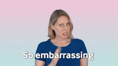 Woman In Blue Shirt Saying So Embarrassing GIF