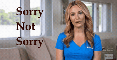 Woman In Blue Shirt Saying Sorry Not Sorry GIF