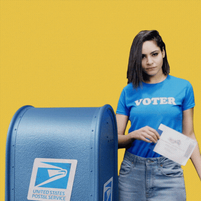 Woman In Blue Shirt Saying Voter Putting Ballot Into Mailbox GIF