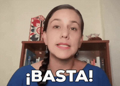Woman In Blue Shirt Says Basta GIF