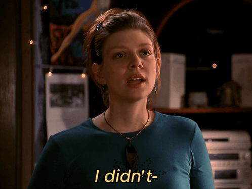 Woman In Blue Shirt Says That You Were Coming In Yellow Letters GIF