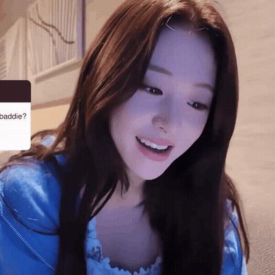 Woman In Blue Shirt Smiling At Baddie Screen GIF