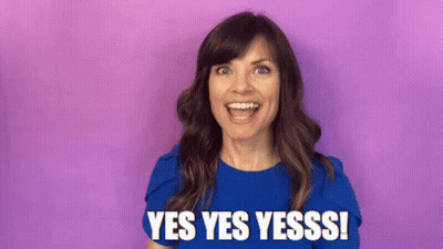 Woman In Blue Shirt Smiling Saying Yes Yes Yesss GIF