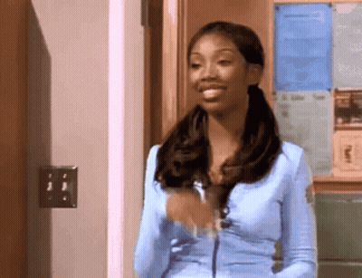 Woman In Blue Shirt Smiling GIF