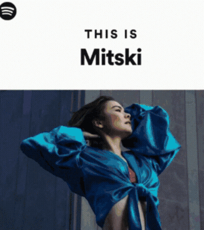 Woman In Blue Shirt Spotify Advertisement GIF