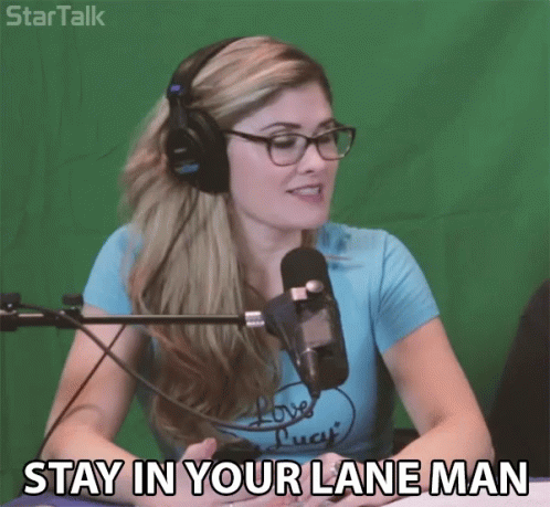 Woman In Blue Shirt Wearing Headphones Says Stay In Your Lane GIF