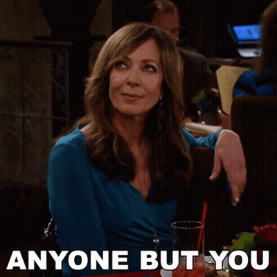 Woman in Blue Shirt With Drink Saying Anyone But You