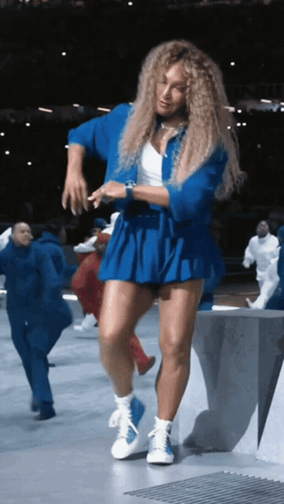 Woman In Blue Skirt Dancing GIF