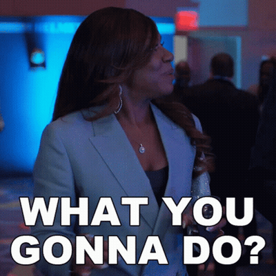 Woman In Blue Suit Asking What You Gonna Do GIF