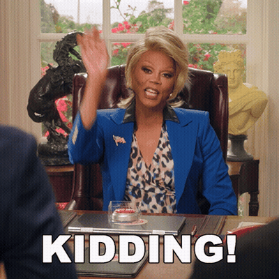 Woman In Blue Suit At Desk Kidding GIF