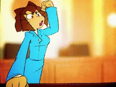 Woman In Blue Suit Making Fist GIF