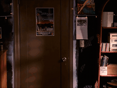 Woman In Blue Sweater By Time Magazine Bookshelf GIF