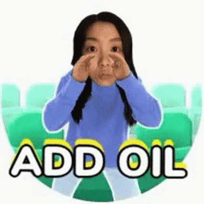 Woman In Blue Sweater Covering Nose Saying Add Oil GIF