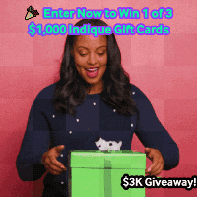 Woman In Blue Sweater Holding Gift Box Enter Now To Win $1,000 Gift Cards GIF